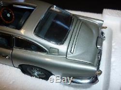 A Danbury mint scale model car of a James Bond's Aston Martin DB5, Goldfinger