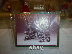 A Franklin mint of a scale model of a Harley Davidson Christmas collection