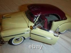 A Franklin mint scale model of a 1950 Chevrolet Belair, boxed. No paper work