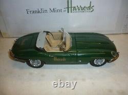 A Franklin mint scale model of a 1961 Jaguar E Type / XKE, Roadster, HARRODS